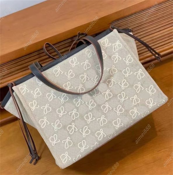 women shopping bags fashion evening shopping bag designer canvas leather embroidered letter large capacity tote handbag beach bag
women shopping bags fashion evening shopping bag designer canvas leather embroidered letter large capacity tote handbag beach bag