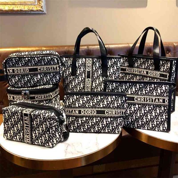 canvas black and white r letter cosmetic bag fashion handbag large capacity mommy portable simple storage bag
canvas black and white r letter cosmetic bag fashion handbag large capacity mommy portable simple storage bag