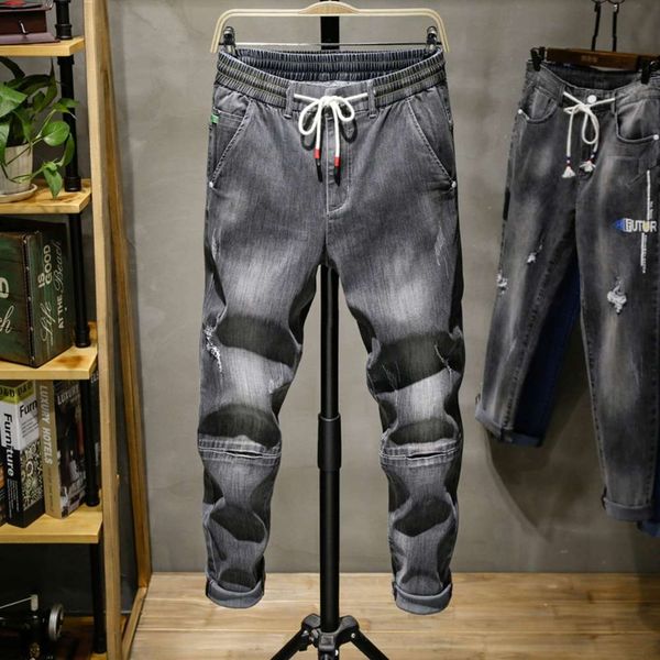 spring and summer 9-point stretch harem pants elastic lace up men's stitching fashion casual jeans with holes in small feet, Blue
spring and summer 9-point stretch harem pants elastic lace up men's stitching fashion casual jeans with holes in small feet, Blue