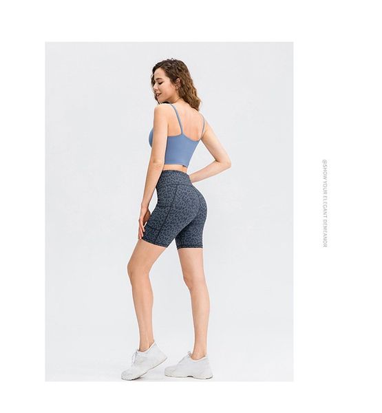 women's high waist workout yoga running exercise shorts with side pockets for workout running cycling yoga, White;black
women's high waist workout yoga running exercise shorts with side pockets for workout running cycling yoga, White;black