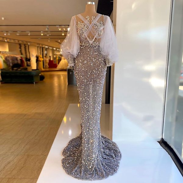 crystal mermaid prom dresses with tulle sequins beading evening dress custom made puffy long sleeves glitter celebrity party gown, Black;red
crystal mermaid prom dresses with tulle sequins beading evening dress custom made puffy long sleeves glitter celebrity party gown, Black;red