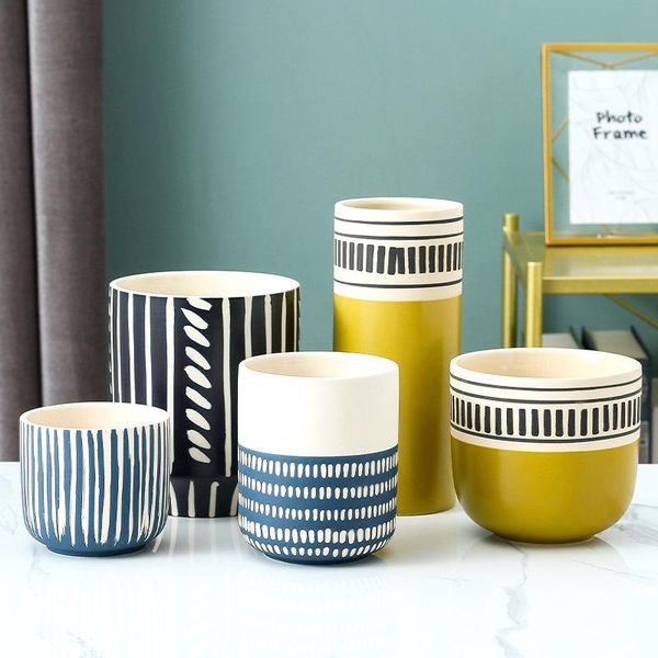 vases for flowers nordic decoration home cylindrical geometric pattern blue and yellow ceramic flowers vase
vases for flowers nordic decoration home cylindrical geometric pattern blue and yellow ceramic flowers vase