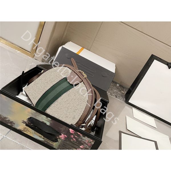 famous designer handbags classic stripe style women cross body bag all-match canvas zipper ladies favorite shell bags
famous designer handbags classic stripe style women cross body bag all-match canvas zipper ladies favorite shell bags