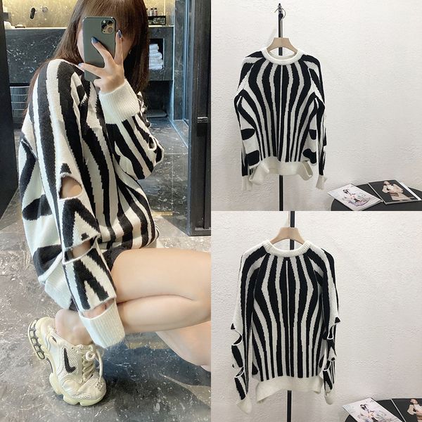 french niche 2020 autumn winter new lazy wind cocoon type pullover black and white color matching hole women's sweater fashion
french niche 2020 autumn winter new lazy wind cocoon type pullover black and white color matching hole women's sweater fashion