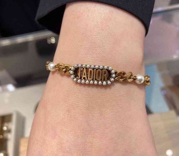 bracelet fashion luxry design jewelry d/or 21 letters pearl square branusegold, Golden;silver
bracelet fashion luxry design jewelry d/or 21 letters pearl square branusegold, Golden;silver