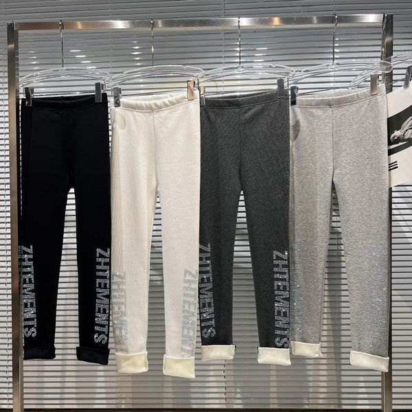 women's pants & capris side letter sequined form fitted legging pant, Black;white
women's pants & capris side letter sequined form fitted legging pant, Black;white