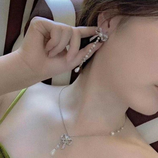 cuff bow earrings c family pearl long fashion tassel jewelry women's net red suit, Silver
cuff bow earrings c family pearl long fashion tassel jewelry women's net red suit, Silver
