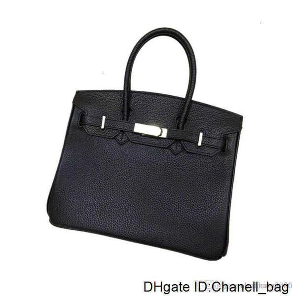 quality lady leather fashion bag, turn lock closure, double handles, come with dust bag medium size
quality lady leather fashion bag, turn lock closure, double handles, come with dust bag medium size