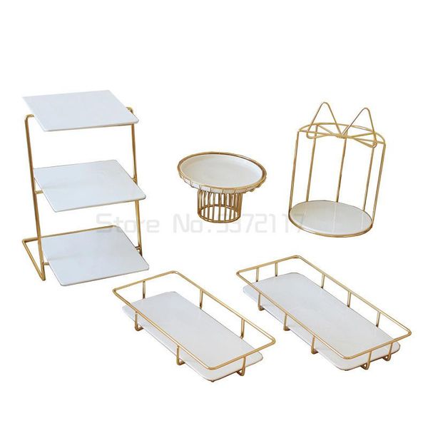 other bakeware golden wrought iron dessert table cake stand white ceramics fruit tray three-tier snack rack high foot display pan
other bakeware golden wrought iron dessert table cake stand white ceramics fruit tray three-tier snack rack high foot display pan