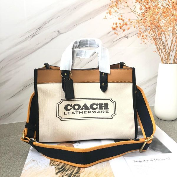 family women's c field tote30 canvas carriage one shoulder messenger handbag bag
family women's c field tote30 canvas carriage one shoulder messenger handbag bag