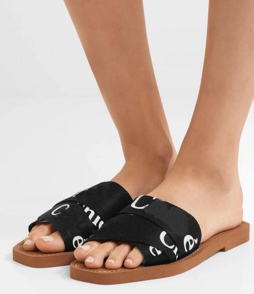 famous women summer beach slippers sandals woody canvas woven mules flat letters elastic slides cross cloth outdoor flip flops eu35-42, Black
famous women summer beach slippers sandals woody canvas woven mules flat letters elastic slides cross cloth outdoor flip flops eu35-42, Black