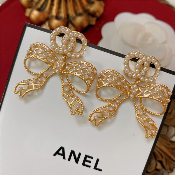 american and french style screw back small fragrance retro pearl big bow pendant earrings earring female temperament silver needle
american and french style screw back small fragrance retro pearl big bow pendant earrings earring female temperament silver needle
