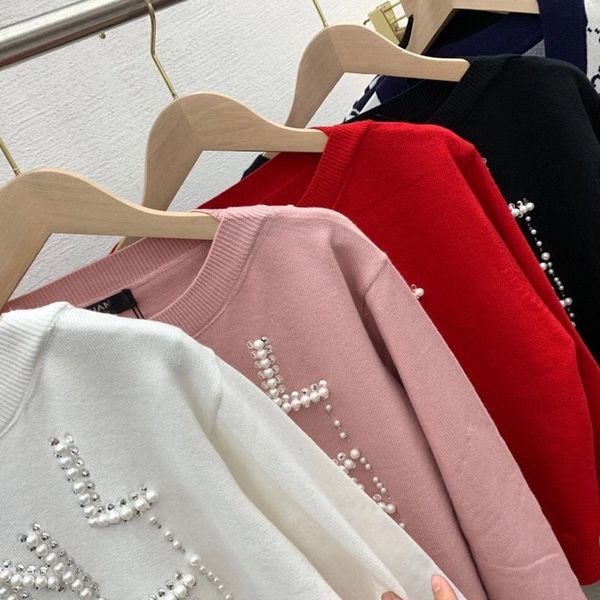 high version heavy industry bead turtlene button knitted sweater temperament loose joker fashion aging jaet women, Black
high version heavy industry bead turtlene button knitted sweater temperament loose joker fashion aging jaet women, Black