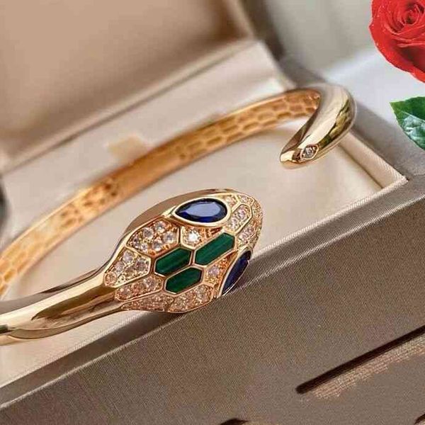 the new baojia snake head 925 sterling silver plated 18k gold diamond inlaid opening white shell snake bracelet hand jewelry, Black
the new baojia snake head 925 sterling silver plated 18k gold diamond inlaid opening white shell snake bracelet hand jewelry, Black