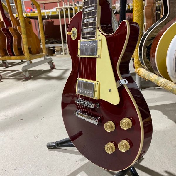 standard electric guitar wine red color chrome hardware rosewood fingerboard mahogany body
standard electric guitar wine red color chrome hardware rosewood fingerboard mahogany body