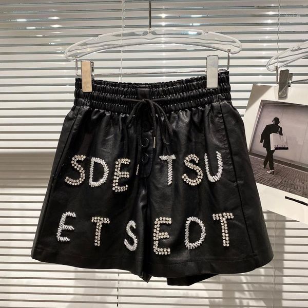 women's shorts manual beaded letter nailed bead women 2021 autumn heavy industry elastic waist three-point pu leather, White;black
women's shorts manual beaded letter nailed bead women 2021 autumn heavy industry elastic waist three-point pu leather, White;black