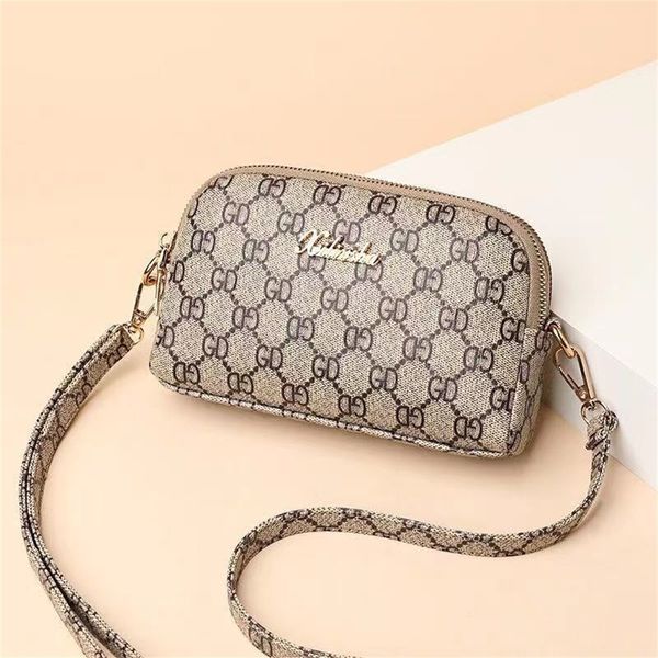 purse mom's one shoulder messenger bag new summer middle aged women's bag soft leather mini hand vegetable shopping mobile phone z
purse mom's one shoulder messenger bag new summer middle aged women's bag soft leather mini hand vegetable shopping mobile phone z