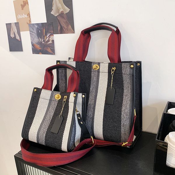 luxury handbags women's new portable tote bag tidal current canvas stripe student one shoulder messenger backpack 
luxury handbags women's new portable tote bag tidal current canvas stripe student one shoulder messenger backpack