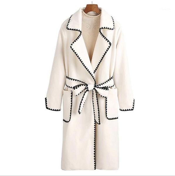 high-quality women's woolen coat 2019 autumn winter black wavy side suit collar long section woolen coat waistband robe jacket1
high-quality women's woolen coat 2019 autumn winter black wavy side suit collar long section woolen coat waistband robe jacket1