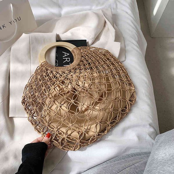 new handbags fashion straw fairy hollow woven wooden handle leisure beach handbag female factory direct sale
new handbags fashion straw fairy hollow woven wooden handle leisure beach handbag female factory direct sale