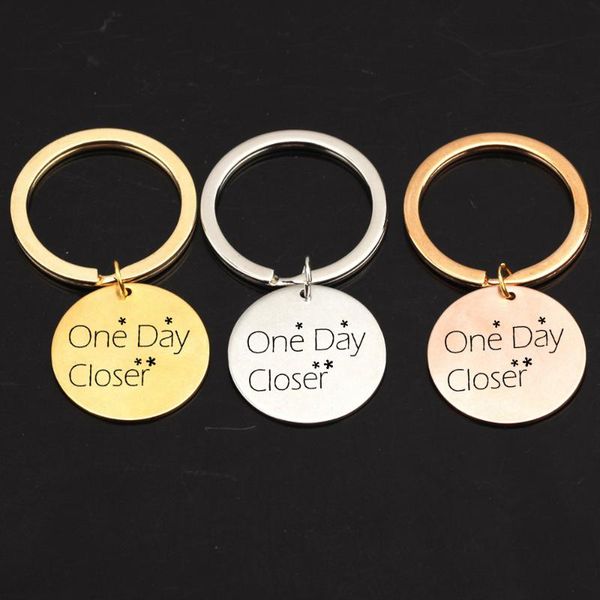 keychains engraved one day closer keychain stamped small flower bag charm key holder for friends lover couples keyring gifts, Silver
keychains engraved one day closer keychain stamped small flower bag charm key holder for friends lover couples keyring gifts, Silver