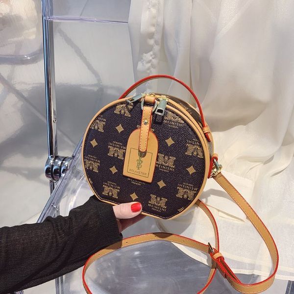 handbag women's 2021 fashion small round printed single shoulder messenger bag cake hand 
handbag women's 2021 fashion small round printed single shoulder messenger bag cake hand