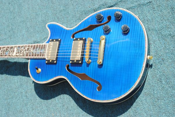simi hollow lp electric guitar flamed maple and back abalone flower fret golden hardware guitarar
simi hollow lp electric guitar flamed maple and back abalone flower fret golden hardware guitarar