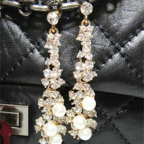 fashion low price selling wholesale 2pairs/lots diamond crystal pearl tassels 925 silver lady's earings 3x
fashion low price selling wholesale 2pairs/lots diamond crystal pearl tassels 925 silver lady's earings 3x