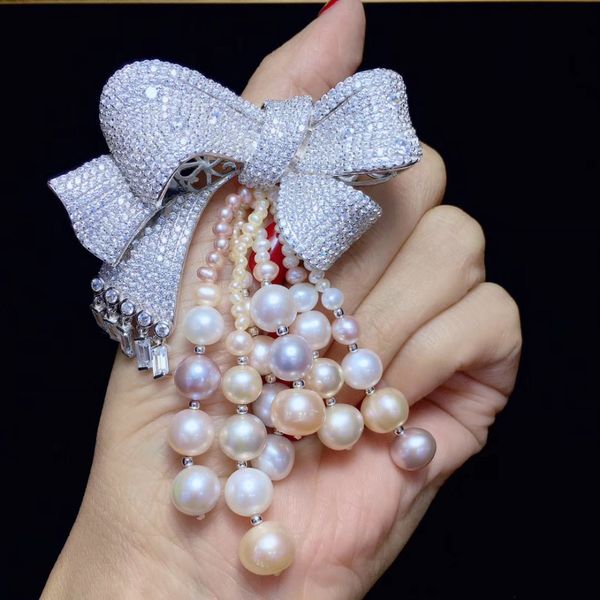 natural fresh water pearl tassels brooch pins 925 sterling silver bowknot fine women jewelry romantic cute, Gray
natural fresh water pearl tassels brooch pins 925 sterling silver bowknot fine women jewelry romantic cute, Gray