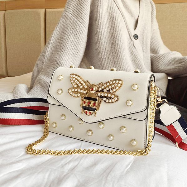 handbag 2021 pearl bee bag shaped simple square tide chain single shoulder messenger bag temperament women's
handbag 2021 pearl bee bag shaped simple square tide chain single shoulder messenger bag temperament women's