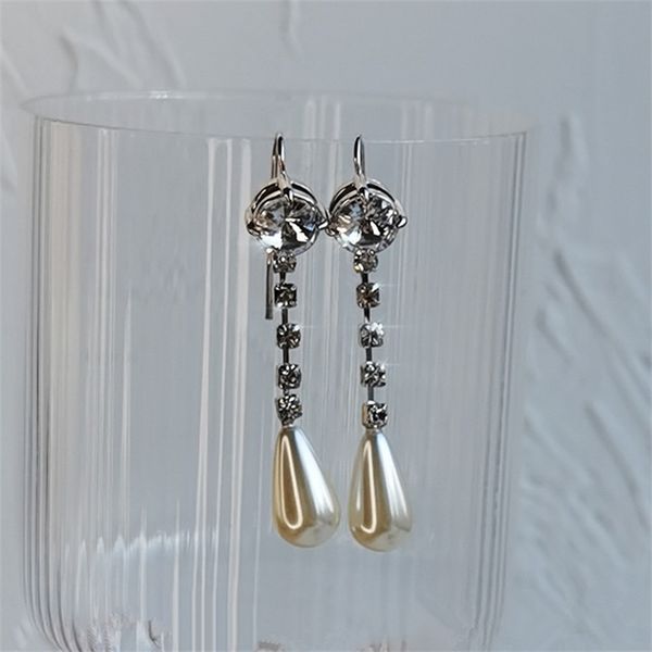 miao family early spring short imitation water drop pearl crystal earrings female miu diamond earrings, Black
miao family early spring short imitation water drop pearl crystal earrings female miu diamond earrings, Black
