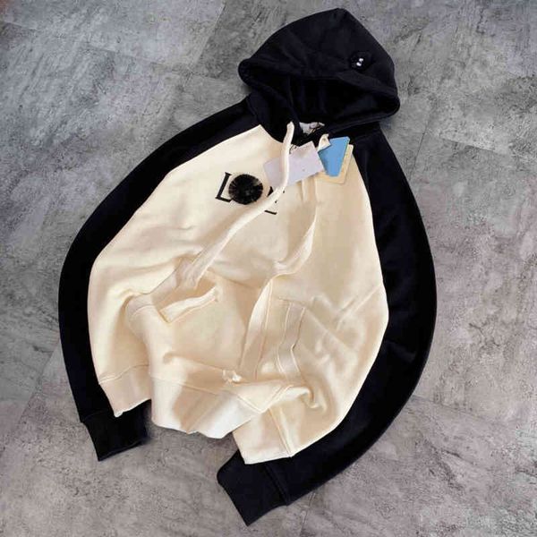 2022 factory wholesale new model dust elf hoodie women's autumn color blocking large loose stitching letter printing coat, Black
2022 factory wholesale new model dust elf hoodie women's autumn color blocking large loose stitching letter printing coat, Black