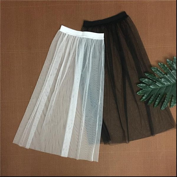autumn winter women lace mesh long skirts solid casual elastic high waist tulle skirt hollow out midi black white skirt
autumn winter women lace mesh long skirts solid casual elastic high waist tulle skirt hollow out midi black white skirt