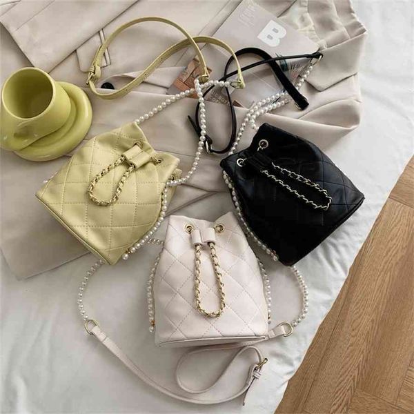 female 2021 lingge chain pearl handbag summer new korean version net red bucket one shoulder slant span bag
female 2021 lingge chain pearl handbag summer new korean version net red bucket one shoulder slant span bag