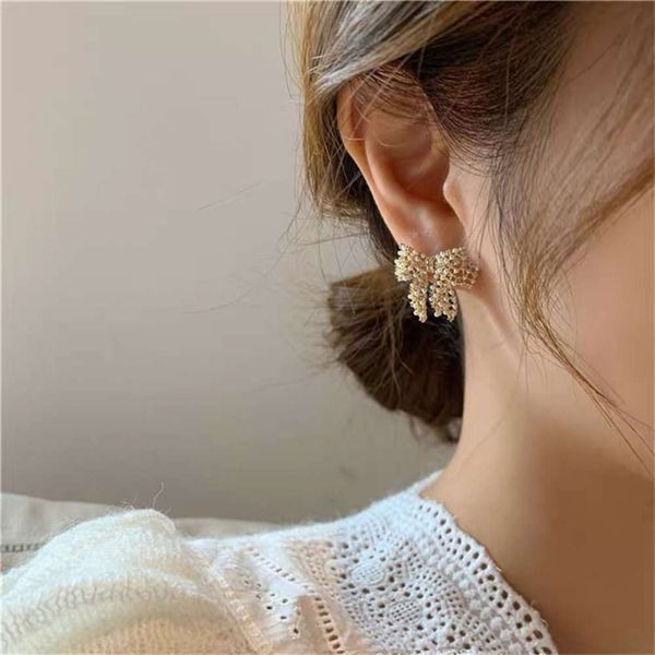 hbp fashion south korea east gate sweet temperament pearl hollow out bow versatile exquisite silver needle earrings
hbp fashion south korea east gate sweet temperament pearl hollow out bow versatile exquisite silver needle earrings