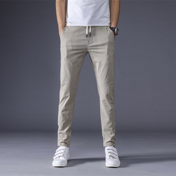 new men's casual pants spring and summer korean fashion slim young people's small foot elastic pants thin student sports pantswint, Black
new men's casual pants spring and summer korean fashion slim young people's small foot elastic pants thin student sports pantswint, Black