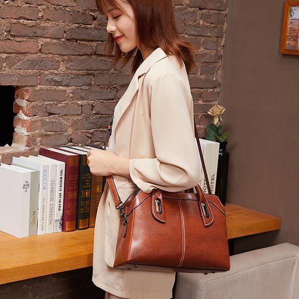 christmas europe and the united states spring classic retro handbag simple elegant leisure oil wax pu leather lady slung big bag
christmas europe and the united states spring classic retro handbag simple elegant leisure oil wax pu leather lady slung big bag