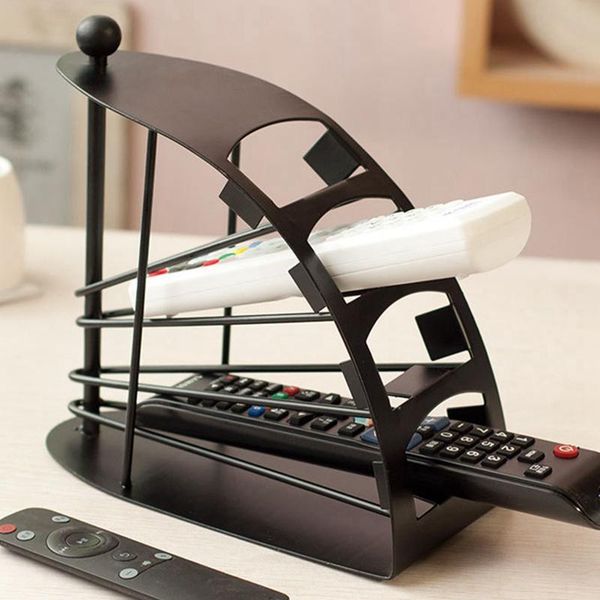 remote control tv handset holder / storage caddy / organiser - holds up to 4 t.v. remotes - black metal arched
remote control tv handset holder / storage caddy / organiser - holds up to 4 t.v. remotes - black metal arched