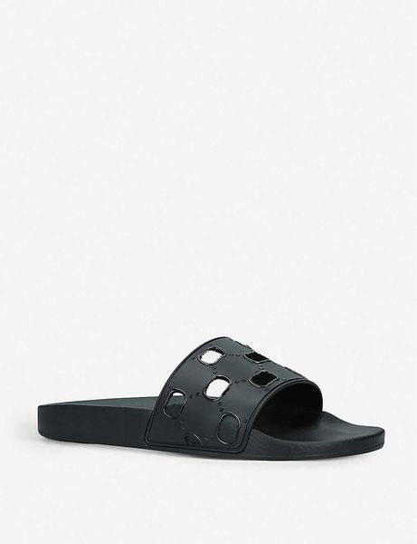 mens womens black cut-out rubber sliders luxe pool flat slippers with designer-stamped sole euro 35-46
mens womens black cut-out rubber sliders luxe pool flat slippers with designer-stamped sole euro 35-46