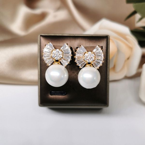 and needle japan s925 silver south korea bow zircon earrings shiny temperament pearl female extravagant personality, Golden;silver
and needle japan s925 silver south korea bow zircon earrings shiny temperament pearl female extravagant personality, Golden;silver