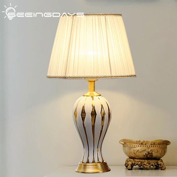 american luxury gold painting vase ceramic table lamp for bedroom living room bedside lamp modern household home decor
american luxury gold painting vase ceramic table lamp for bedroom living room bedside lamp modern household home decor