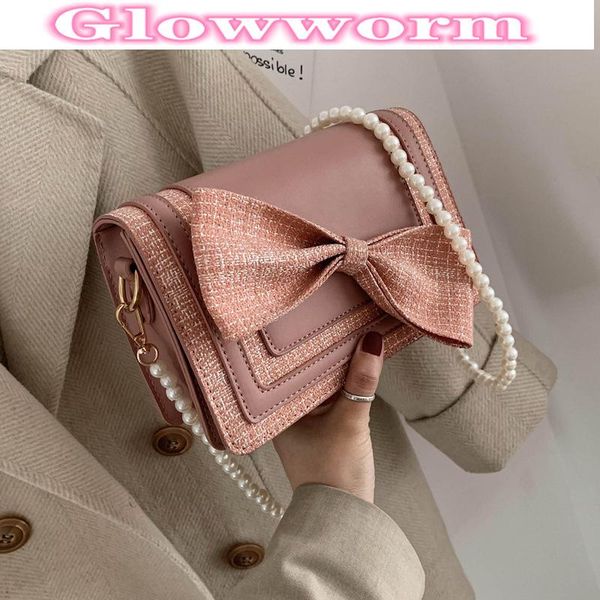 cross body 2021 female small pearl bag cute korean style women large capacity tote girl's pink bowknot messenger
cross body 2021 female small pearl bag cute korean style women large capacity tote girl's pink bowknot messenger
