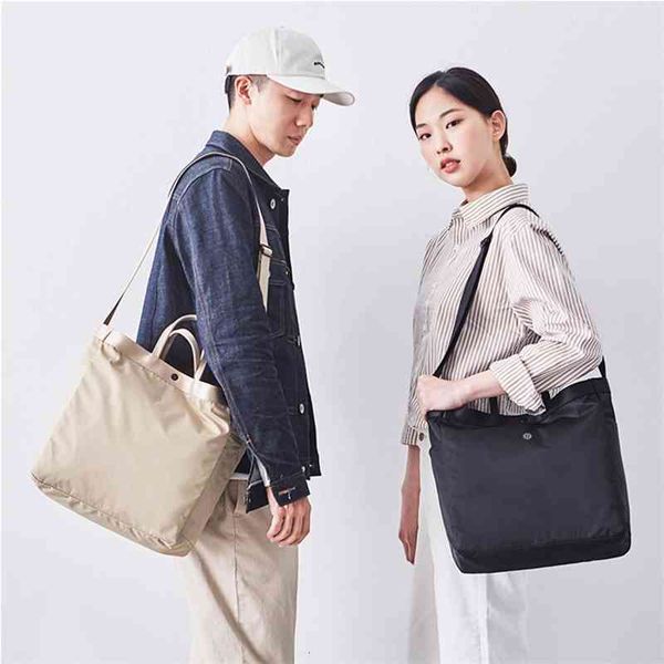 lulu with standard outdoor travel leisure shopping business simple fashion portable messenger computer bag 
lulu with standard outdoor travel leisure shopping business simple fashion portable messenger computer bag