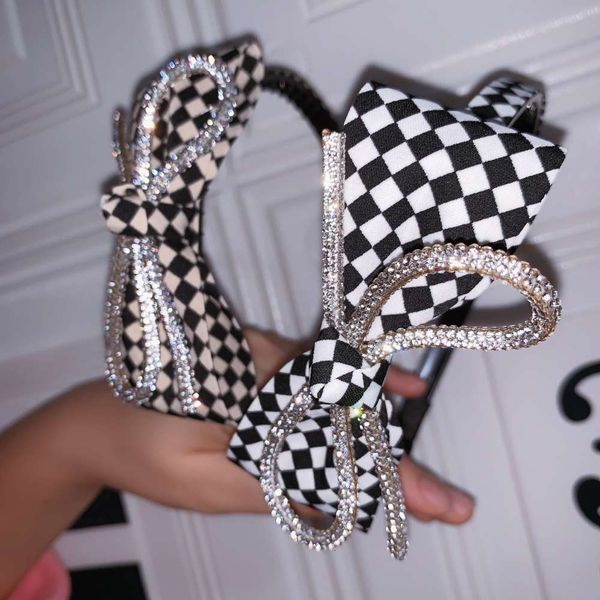 fashion rhinestone large hoop flash black white checkerboard temperament hairpin, Black;brown
fashion rhinestone large hoop flash black white checkerboard temperament hairpin, Black;brown