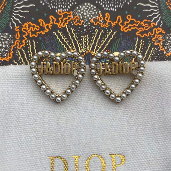 2021 d family heart-shaped letter pearl earrings brass 925 sier needle star same, Golden
2021 d family heart-shaped letter pearl earrings brass 925 sier needle star same, Golden