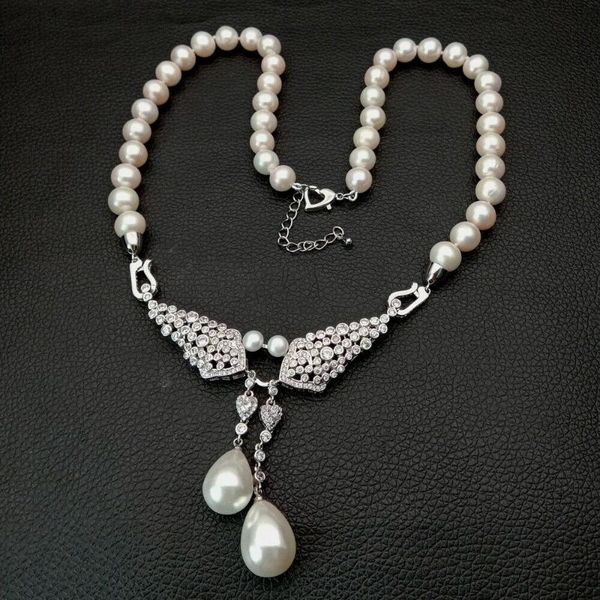 chains hand knotted 51cm natural cultured 8-9mm white freshwater pearl necklace sea shell cz pendant fashion jewelry, Silver
chains hand knotted 51cm natural cultured 8-9mm white freshwater pearl necklace sea shell cz pendant fashion jewelry, Silver