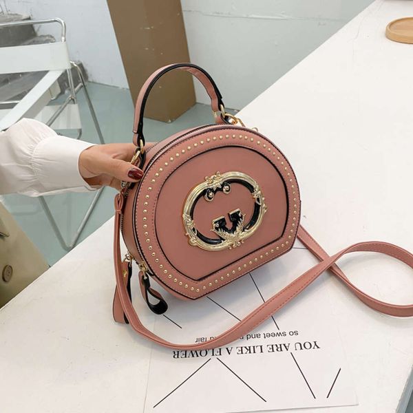 fashion wanghong small round 2020 korean double zipper handbag single shoulder saddle messenger rivet bag
fashion wanghong small round 2020 korean double zipper handbag single shoulder saddle messenger rivet bag