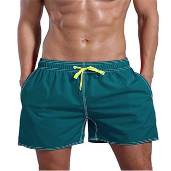 men's shorts summer european and american beach pants solid color cotton multicolor foreign trade plus size three-quarter, White;black
men's shorts summer european and american beach pants solid color cotton multicolor foreign trade plus size three-quarter, White;black