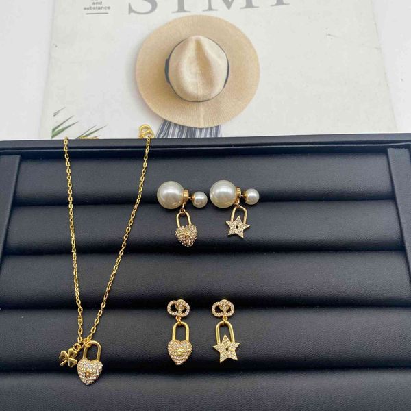 family suit love diamond inlaid lock necklace women's net red temperament star pearl earrings women, Golden;silver
family suit love diamond inlaid lock necklace women's net red temperament star pearl earrings women, Golden;silver