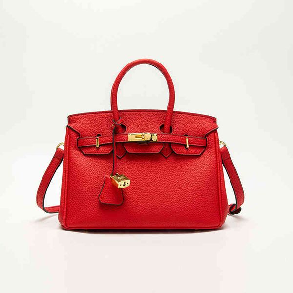 net red versatile niche litchi pattern 2020 new fashion hand large capacity kelly women's bag
net red versatile niche litchi pattern 2020 new fashion hand large capacity kelly women's bag